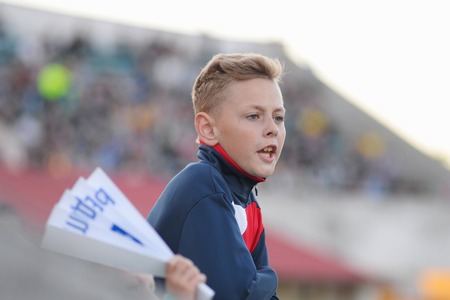 MINSK, BELARUS - MAY 23, 2018: Little fan react during the Belarusian Premier League football match...