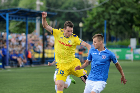 MINSK, BELARUS - JUNE 29, 2018: Soccer players fights for ball during the Belarusian Premier League football match between FC Luch and FC BATE at the Olimpiyskiy stadium.のeditorial素材