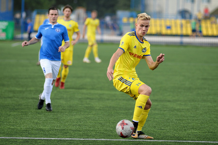 MINSK, BELARUS - JUNE 29, 2018: Soccer players fights for ball during the Belarusian Premier League football match between FC Luch and FC BATE at the Olimpiyskiy stadium.のeditorial素材