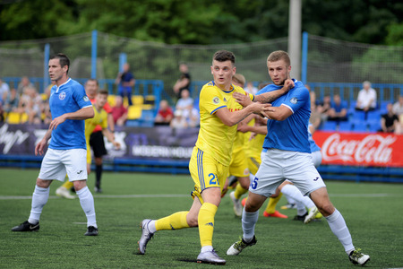 MINSK, BELARUS - JUNE 29, 2018: Soccer players fights for ball during the Belarusian Premier League football match between FC Luch and FC BATE at the Olimpiyskiy stadium.のeditorial素材