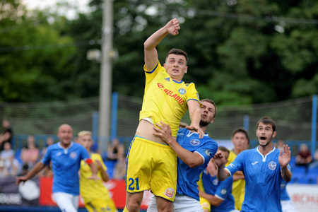 MINSK, BELARUS - JUNE 29, 2018: Soccer players fights for ball during the Belarusian Premier League football match between FC Luch and FC BATE at the Olimpiyskiy stadium.のeditorial素材