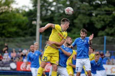 MINSK, BELARUS - JUNE 29, 2018: Soccer players fights for ball during the Belarusian Premier League football match between FC Luch and FC BATE at the Olimpiyskiy stadium.のeditorial素材