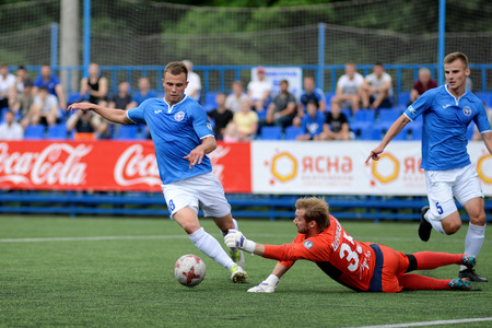 MINSK, BELARUS - JUNE 29, 2018: Soccer players fights for ball during the Belarusian Premier League football match between FC Luch and FC BATE at the Olimpiyskiy stadium.のeditorial素材