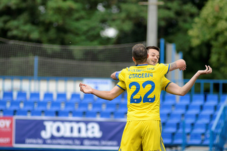 MINSK, BELARUS - JUNE 29, 2018: Soccer players celebrate goal during the Belarusian Premier League football match between FC Luch and FC BATE at the Olimpiyskiy stadium.のeditorial素材