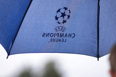 MINSK, BELARUS - JUNE 29, 2018: Umbrella with UEFA champions league icon during the Belarusian Premier League football match between FC Luch and FC BATE at the Olimpiyskiy stadium.のeditorial素材