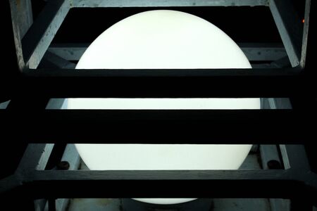 Round fluorescent lamp in a square frameの写真素材