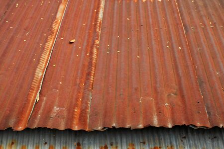 Rusty zinc roof as a backgroundの写真素材