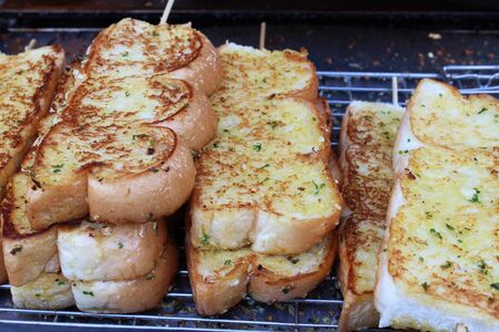 Toasted bread topped with butter - garlic mashed - coriander and spring onions