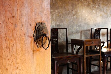 Ancient wooden door with Chinese iron ring