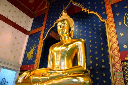 The golden meditating Buddha statue, Bangkok, Thailandの写真素材