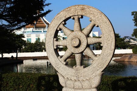 Dharmachakra-the wheel of dhamma in thai temple at Bangkok, Thailandの写真素材
