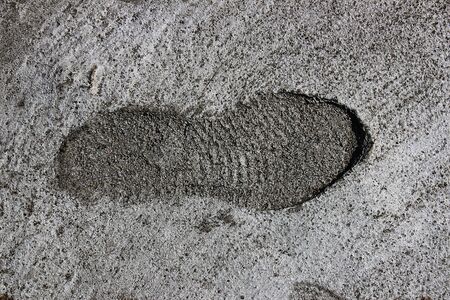 Footprint on concrete as a background