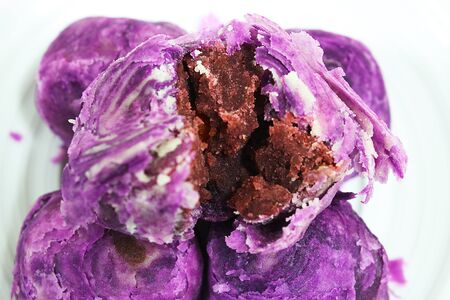 Purple Chinese pastry cake stuffed with purple yam and salted egg