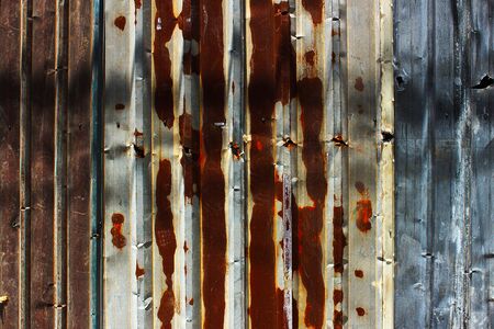 Rust galvanized fence as a backgroundの写真素材