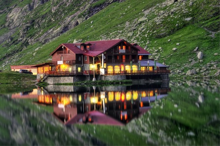 house reflection in water 