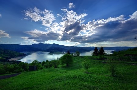 mountain and lake landscape in spring season, Romaniaの写真素材