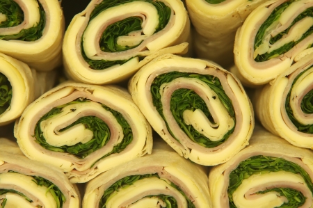 fast food rolls texture with vegetable, cheese and meatの写真素材