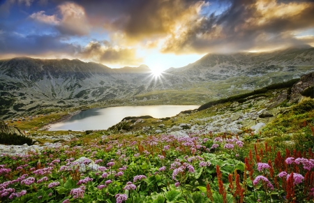 mystic mountain sunset with lake in autumnの写真素材