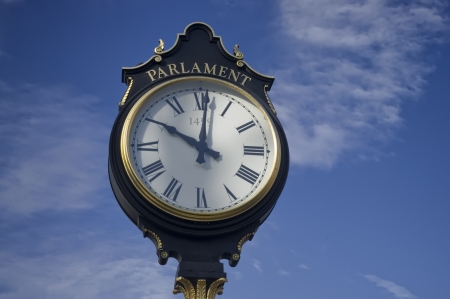 vintage clock in front of Ceausescu s Palace, Bucharest, Romaniaの写真素材
