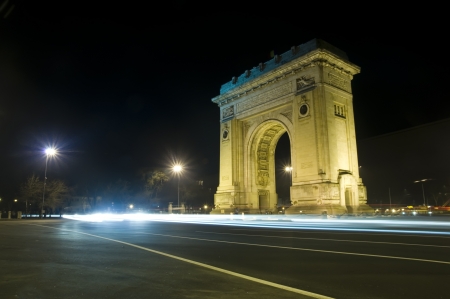 Arch of Triumph in Bucharest - Romania night sceneの写真素材