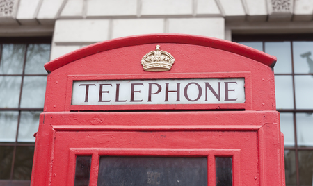 details of red telephone cabin in London city, United Kingdom