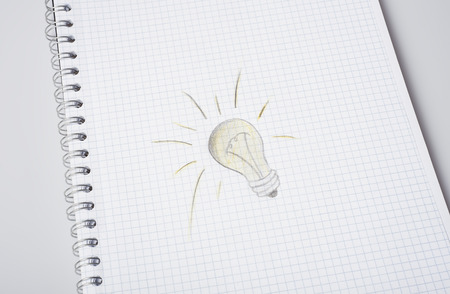 hand drawn light bulb on paperの写真素材