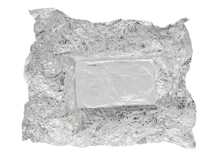 aluminum foil  with space for text isolated on white backgroundの写真素材