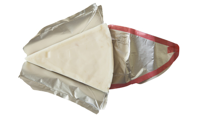 melted cheese triangle isolated on whiteの写真素材