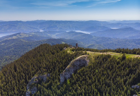aerial view of Ceahlau mountain with rocky stone and forest landscape. Romaniaの写真素材