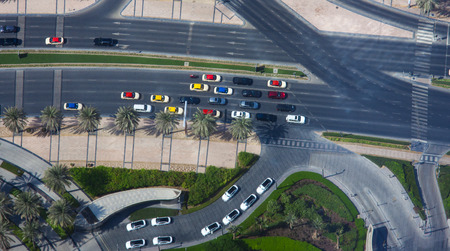 aerial view of intersection with car traffic in the cityの写真素材
