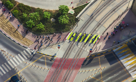 people crossing the road on zebra, city center of Dubaiの写真素材