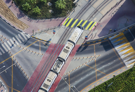 tram on railway in Dubai city, Aerial view