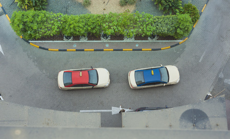taxi cars waiting in front of hotel. aerial viewの写真素材
