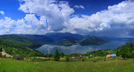 summer landscape in Romania. Ceahlau mountain and beautiful Bicaz lakeの写真素材