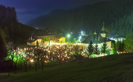 church with resurrection night lights in Romaniaの写真素材