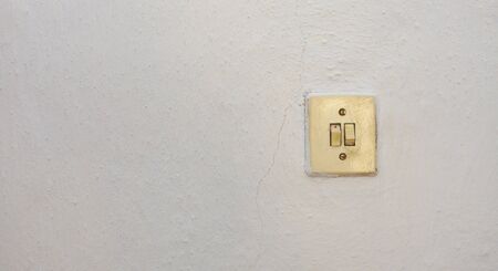 old wall switch for electric bulbの写真素材