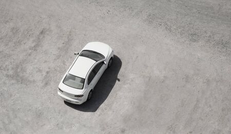 white car parked in the sand. aerial viewの写真素材