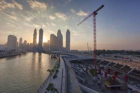 Dubai city and construction site in United Arab Emirates