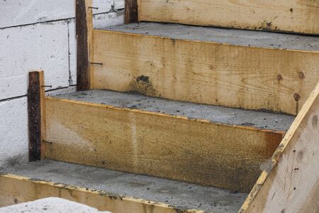 concrete stairs construction with wooden sheatingの写真素材