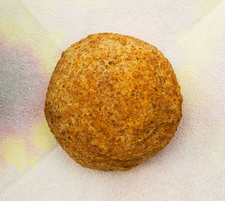 home baked bun on a napkin