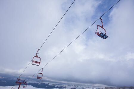 chair lift for ski slope in the mountainの写真素材