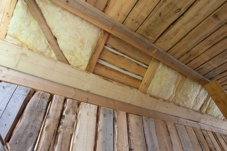 glass wool isolation in a wooden house construcitonの写真素材