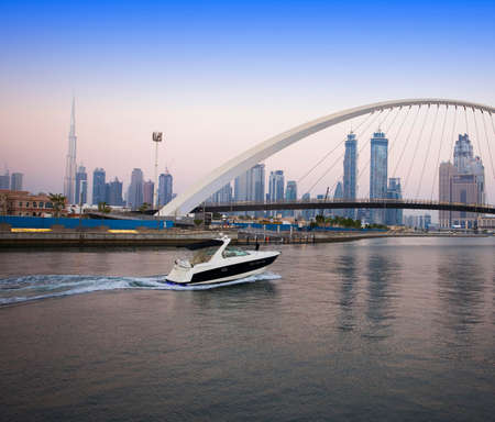 Tolerance bridge and boat in Dubai city, UAEの写真素材