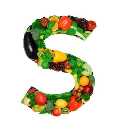 Letter made from fresh vegetables a fruits isolated on white backgroundの写真素材