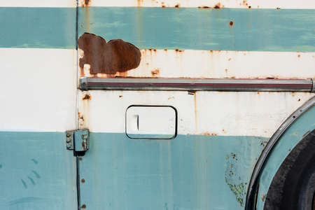 Close up of an old rusty bus, vintage backgroundの写真素材