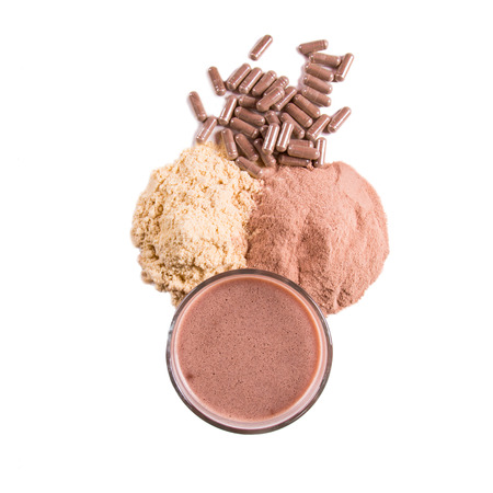 sports, fitness, diet and food concept - close up of jar, protein, gainer shake, isolated on whiteの写真素材