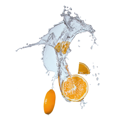 Fresh fruits, orange falling in water splash, isolated on whiteの写真素材