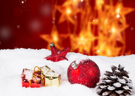 Christmas border with ornament, golden, red present and snowの写真素材