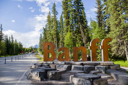 Entrance sign the city of Banff. Nature Rocky Mountain national parkの写真素材