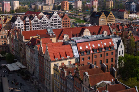 Gdansk, Poland Historical brick colorful building, red roofs and Baltic sea canal. Sunny day, spring time. Aerial view.の写真素材